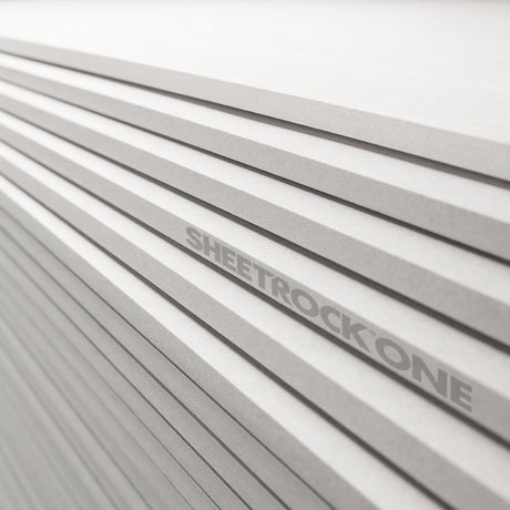 Plasterboard sheets stacked neatly