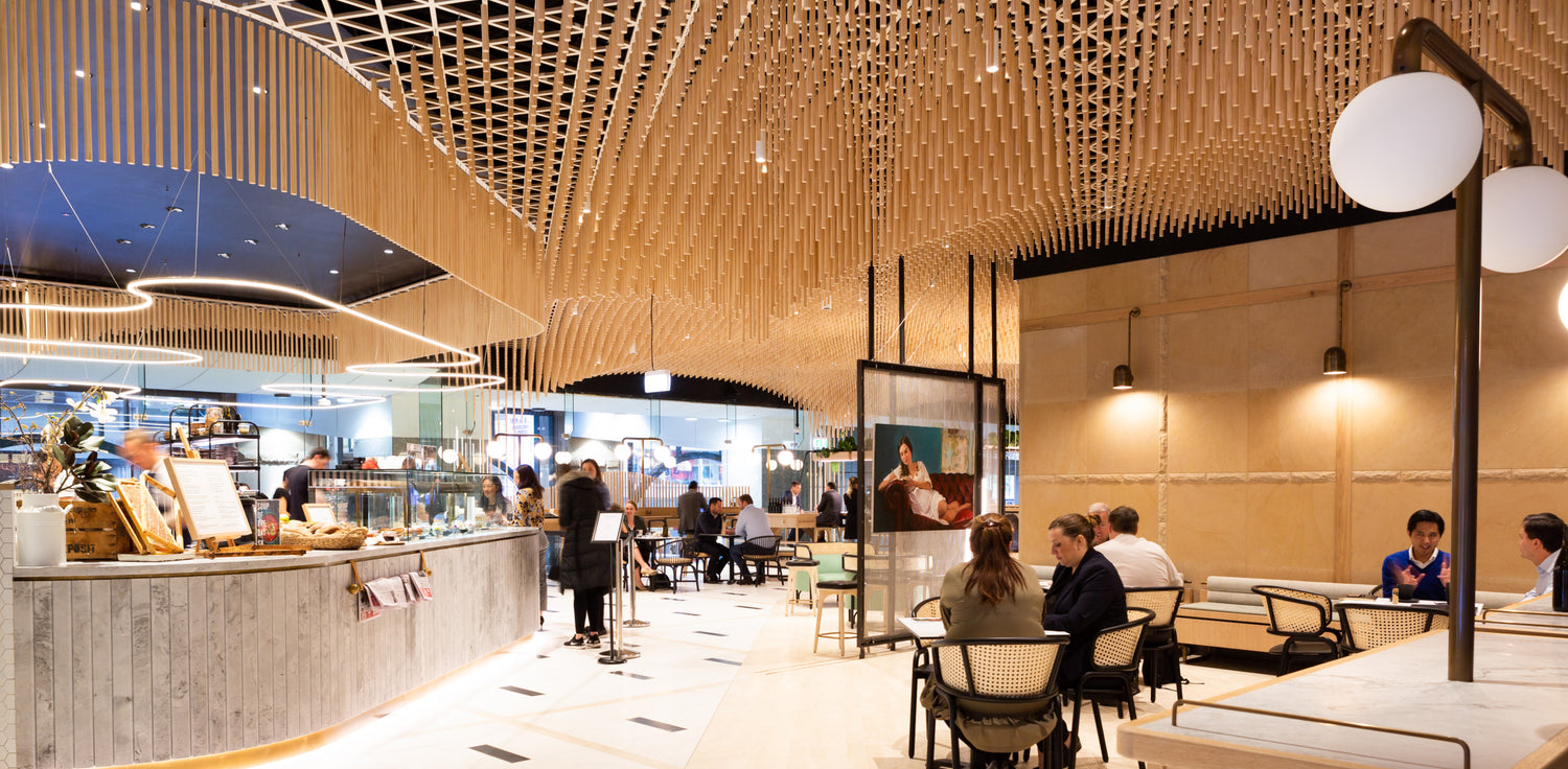 Large plywood ceiling feature in a commercial interior